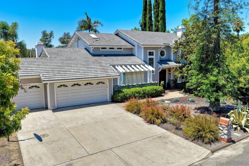 Amazing opportunity to live in this beautiful home in the heart of Bridlewood Lakeside. This stunning home has two full bedrooms and baths downstairs! Home features: fully paid for solar, beautiful cabinetry and corian counters, upgraded wood flooring, kitchen center island, large walk in pantry, vaulted ceilings, copper plumbing, reroofed in 2019, plantation shutters, roman blinds, ceiling fans, alarm system, plus more! Primary bath has large walk in closet, spacious soaking tub and separate shower, dual vanities, and great lighting. This nearly half acre property has amazing views (think 4th of July firework shows), large two tiered lot, multiple fruit trees, corner lot that is walking distance to Lake Poway and Poway High school. No Hoa or mello roos
