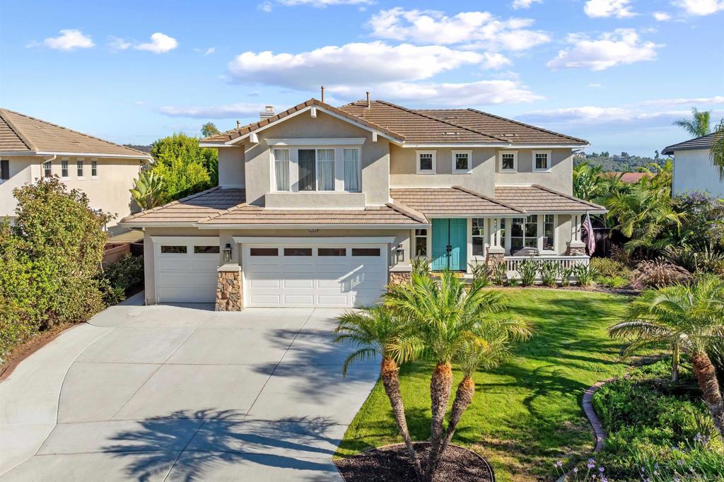 Tucked away on a quiet cul-de-sac just minutes from the beach, this stunning 5BR, 3BA single family home offers 2960 sq. ft. of beautifull living space along with a backyard oasis built for entertaining. Step inside and be greeted by soaring 18 ft. ceilings, abundant natural light from oversized windows and French doors leading to the back yard. The heart of the home is a spacious family kitchen with granite countertops, an island & all appliances. The adjacent family room has a cozy gas fireplace and sliding glass doors to the outdoors. The primary suite is a true retreat, featuring a private balcony, sitting nook, spa like bath & walk-in closet. Upstairs you will also find 3 additional bedrooms & a full bath in the hallway. The first floor en-suite 5th bedroom/bath has a large walk-in closet and is perfect for guests, a home office or multi-generational living. The back yard is a resort style paradise with quartz pool, infinity spa, fire pit, artificial turf and a lighted fully fenced setting designed for year-round enjoyment. Entertain in style under the Palapa, complete with built-in Bull BBQ, griddle, gas cooktop, sink, fridge and TV. set-up, perfect for hosting game nights or summer gatherings. Home has fully owned solar, & CAT 5 wiring throughout. The 3 car garage comes with a 50A Tesla charger, & epoxy flooring. Additional parking in driveway for up to 5 cars. Walking distance to the beach, minutes to downtown Oceanside and seamless access to I-5. No HOA, No Mello Roos. Call today to schedule a tour.