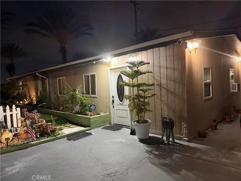 Photo of 12501 Willowood Ave, Garden Grove, CA 92840 (MLS # SR25262817)