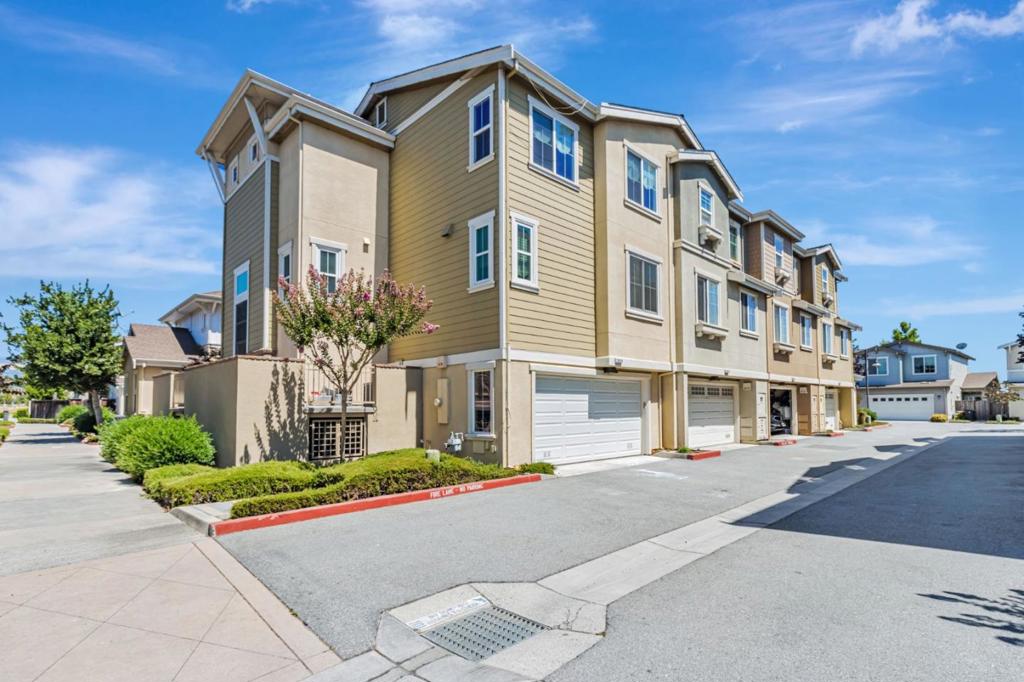 Welcome to a beautifully maintained 3-bedroom, 2.5-bath end-unit townhouse offering style, space, and comfort in a desirable Morgan Hill community. This light-filled home features hardwood floors, soaring ceilings, and a freshly painted interior that enhances its inviting ambiance. The open-concept kitchen is equipped with granite countertops, stainless steel appliances, and ample cabinetry, perfect for both daily living and entertaining. Upstairs, youll find plush carpeted bedrooms, including a spacious primary suite, and a full laundry room with washer and dryer provided. The home also boasts a generous wrap-around porch for outdoor relaxation and an oversized 2-car garage with extensive storage space under the houseideal for keeping everything organized. With split zone AC, water softener and newer double paned Anderson windows you'll find this home checks all the boxes. Located in a serene community with resort-style amenities, enjoy access to a sparkling pool and spa, bocce court, playground, and BBQ area. Conveniently situated near shopping, dining, parks, and major commute routes, this turnkey property is the perfect blend of comfort and convenience. Additional amenities include a community spa/hot tub for relaxation and central AC for year-round comfort.
