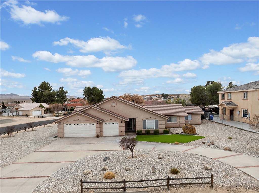 This is a very desirable 4 bedroom, 2.5 bathroom home located on a large corner lot in the equestrian area of the Silver Lakes Association. The well designed kitchen has stainless steel appliances and granite countertops there is a large walk-in pantry. There is a spacious island conveniently located in the center of the kitchen equipped with a water osmosis filtration system and ample storage. The laundry room is located just inside the garage which has a half bath, conveniently located adjacent to it. The dining area has a beautiful bay window overlooking the mature chinaberry tree. Enjoy relaxing in the living area that has dramatic vaulted ceiling, spacious living area with gas fireplace. There are three bedrooms with well maintained carpeted flooring, spacious closets and large windows with vertical blinds. The guest bathroom has dual sinks, full bath and shower and a solar tube which provides ambient lighting. The primary suite has a walkout sliding glass door providing direct access to the covered patio area and the beautiful back yard, custom pot shelves, walk-in closet. The primary bath has a Jacuzzi tub, walk-in shower, large walk-in closet, dual vanities with spacious countertops and private water closet. The three car garage has an extensive collection of cabinets and workbench space with access to the side yard. There is Halo water filtration system is located in the shed which has been built on a cement slab, has shelves with an electrical panel and houses the controls to an irrigation system with an RV connection. There is a circular driveway accented by red bricks. The front yard has a beautiful low maintenance landscaping. The home has a solar system with an assumable lease. The seller has confirmed with the Association, this property is large enough to add an ADU, with proper permits. With ownership of this beautiful home comes the use of all Sliver Lakes Association amenities!