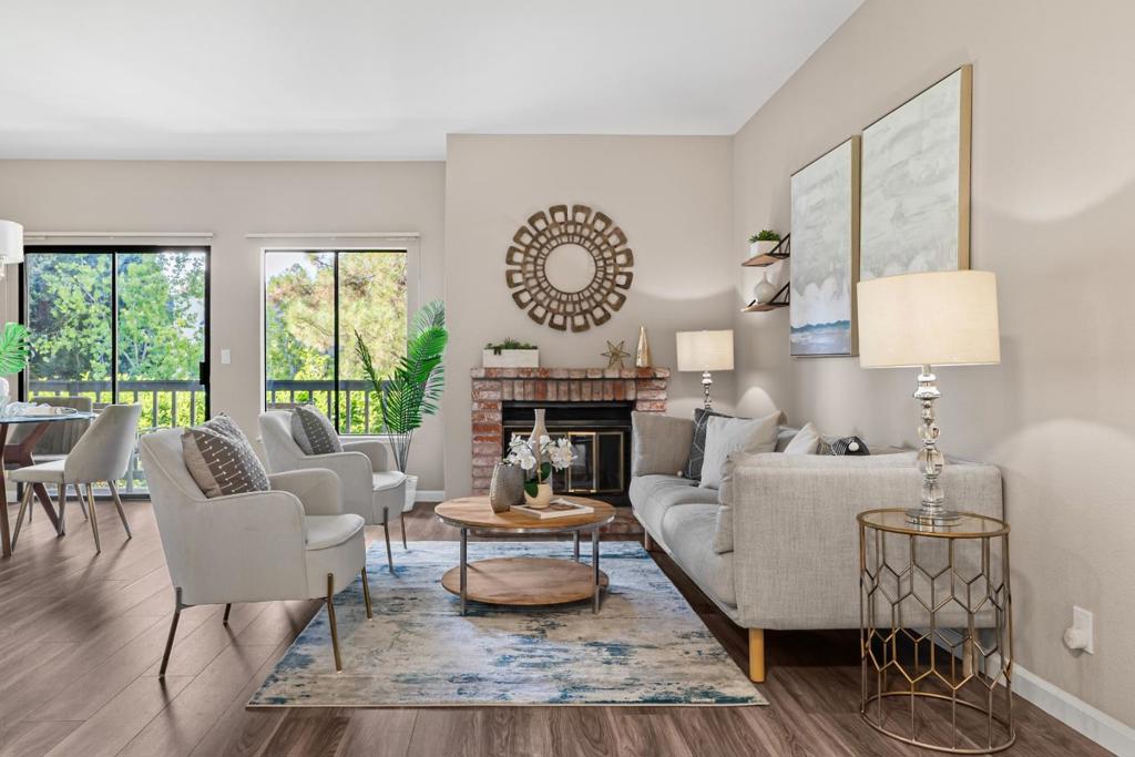 Welcome to this well-maintained 2-bedroom, 1-bath condo in the desirable gated community of Miramar Plaza. Ideally located within the complex, this unit faces the pool with no buildings directly in front, offering open views and a pleasant outlook. The functional layout features a combined living and dining area that opens to a private balcony with views of surrounding greenery. In-unit washer and dryer provide added convenience, and a private one-car garage just downstairs offers easy and direct access. HOA includes water, garbage, exterior maintenance, and more, providing great value and ease. The community features secure entry, a swimming pool, mature landscaping, and ample guest parking. Centrally located close to Apple, Nvidia, and other major tech companies, with quick access to Lawrence Expressway, El Camino Real, and Highways 101 & 280. Minutes from parks, shopping, dining, grocery stores, and other everyday conveniences. Don't miss this opportunity to own a charming home in a Santa Clara neighborhood that makes daily life simple!