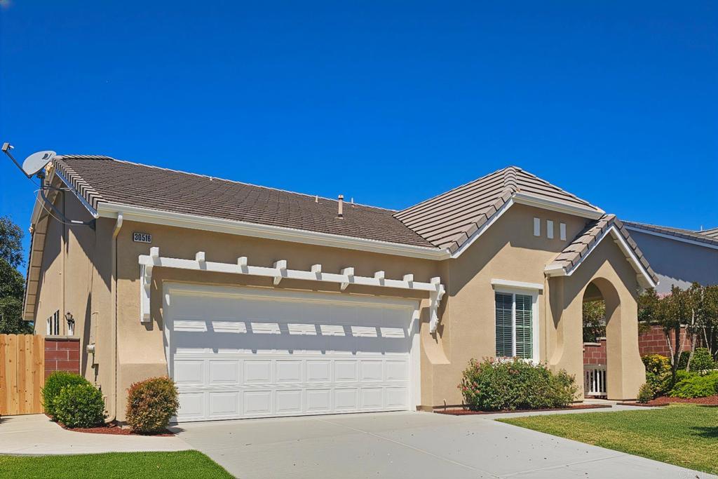 Welcome to the sought-after Central Park community! This beautifully upgraded 3BED/2BATH, Single-Story home combines comfort, style, and convenience, with access to a clubhouse, pool, spa, large grassy park, pickleball and tennis courts, scenic walking trails, playground, and more—all with low HOA fees. Inside, enjoy a freshly painted interior and exterior, new Stainmaster luxury vinyl plank flooring, updated fixtures, and brand new stainless steel stove top and refrigerator. The open-concept kitchen features a large island with bar seating and generous cabinetry, flowing into multiple living spaces, including a family room, a living room, and a versatile den/office. With three bedrooms, two bathrooms, an indoor laundry room, and a two-car garage, everything is designed for ease of use on one level. The private backyard offers a covered patio, lush landscaping, and no rear neighbors, providing extra space between homes. This move-in-ready Single-Story gem is the perfect blend of style, function, and community amenities.
