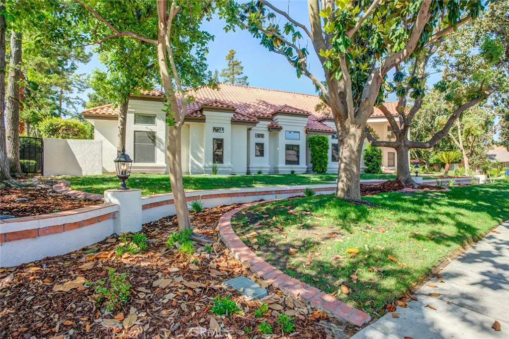 Beautifully remodeled home in prestigious Stockdale Estates! This expansive residence offers 4 spacious bedrooms, an office, a loft, and 5 modern bathrooms. Enjoy soaring vaulted ceilings, a formal living room, large formal dining, and a separate family room complete with a wet bar perfect for entertaining. The gourmet chef's kitchen features brand-new appliances, quartz countertops, custom cabinetry, and breakfast nook. Three luxurious primary suites boast generous closets and newly renovated en suite bathrooms. The fourth bedroom is ideal as a private in-law suite with a walk-in closet, a .75 bath, and a brand-new kitchenette. Step outside to a serene backyard with a covered patio, sparkling pool, and spa with an outdoor shower your personal retreat for relaxation or gatherings. An oversized garage to fit up to 6 cars, offers ample space for vehicles, storage, or a workshop. This stunning home combines comfort, style, and functional its perfect for families or entertaining guests!