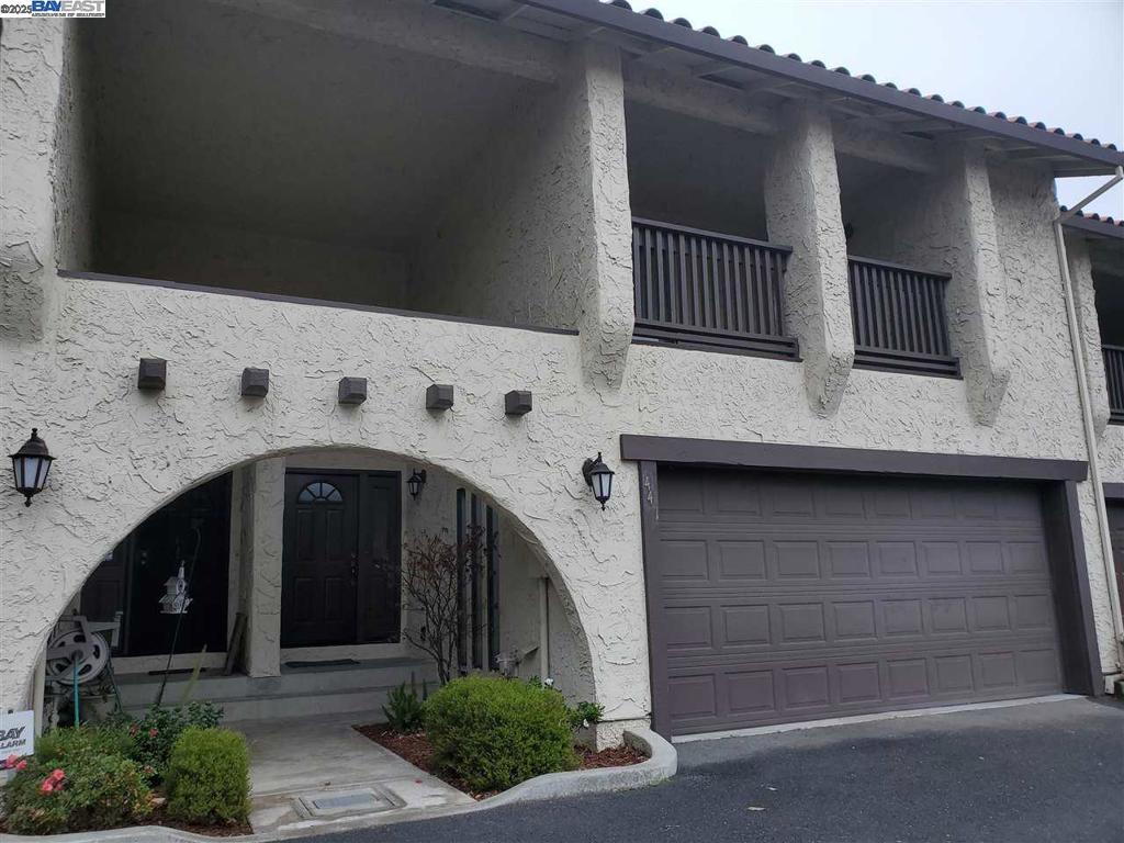 Gorgeous spilt-level townhouse available near downtown Hayward. Tucked away in the established neighborhood of Southland Villas, this townhouse measures 1,442 Sqft. with 2 master bedroom suites, 2.5 bathrooms and a 2-car garage. Vinyl plank flooring covers the lower level with updated carpet upstairs. All new interior paint. The kitchen features, new quartz counter tops, updated canned lighting and polished cabinets. It comes equipped with new stainless steel appliances: electric stove/oven, refrigerator and dishwasher. Each master suite offers spacious rooms, plenty of closet space and private bathrooms. The larger master also boasts a walk in closet and a covered balcony. The back patio includes new landscaping; artificial grass and drought tolerant plants. Additional amenities include: hookups for washer & dryer, baseboard heaters, fireplace, access to the community pool. Owner covers HOA dues. Close to Downtown Hayward *INFORMATION IS DEEMED RELIABLE, BUT IS NOT GUARANTEED.