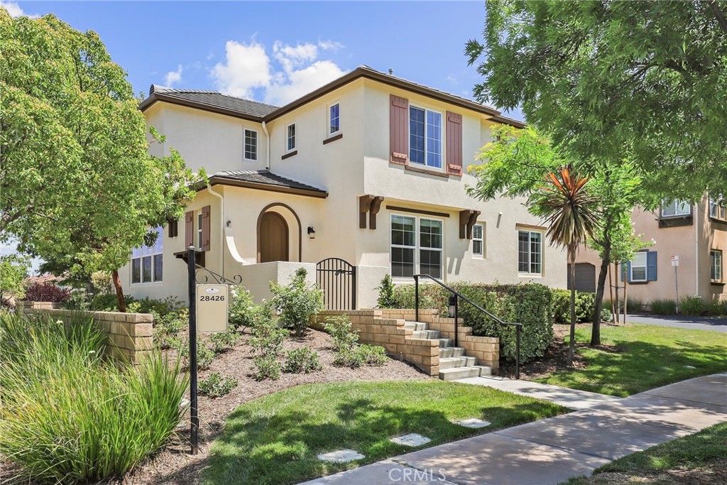 Welcome to one of the most desirable homes in the prestigious Aria Tract of West Creek! This beautifully upgraded three-bedroom two-and-a-half bathroom corner-lot residence boasts one of the largest private yards in the entire community and even includes a rare virtually private guest parking spot, plus your oversized two-car garage. From the moment you enter, you'll notice the warmth and charm, with engineered hardwood flooring flowing through the entryway, kitchen, and dining room. The spacious living room features a custom built-in bench and entertainment center, creating a perfect space to relax or entertain.
Glass doors lead you to a stunning backyard retreat, complete with a custom stone patio, attached patio cover, grassy play area, beautiful landscaping, and a raised wooden deck—ideal for entertaining or simply unwinding. The thoughtfully landscaped yard also features stone planters that add evening ambiance. Inside, the kitchen is a chef's dream with granite countertops, upgraded stainless appliances including a split oven, and custom butcher block workspace with added built-in cabinetry. Adjacent to the kitchen is a bright dining area and a conveniently located half bathroom.
Upstairs, a built-in desk area off the landing provides a great spot for working or studying. All three bedrooms are generously sized with ample closet space. The secondary bedrooms share a well-appointed bathroom with stone tile flooring and a shower/tub combo. The expansive primary suite offers a spa-like bathroom with a glass-enclosed shower, large soaking tub, stone tile flooring, and dual closets—one of which has been thoughtfully converted into a private home office with its own window for natural light.
This home has been recently painted inside and out and includes brand-new carpet. As a resident of West Creek, you'll have access to three sparkling pool and spa areas, BBQ facilities, and a private clubhouse. Top-rated schools, scenic paseos, and excellent dining and shopping are just minutes away. This rare opportunity combines location, upgrades, and lifestyle—don't miss your chance to make it yours!