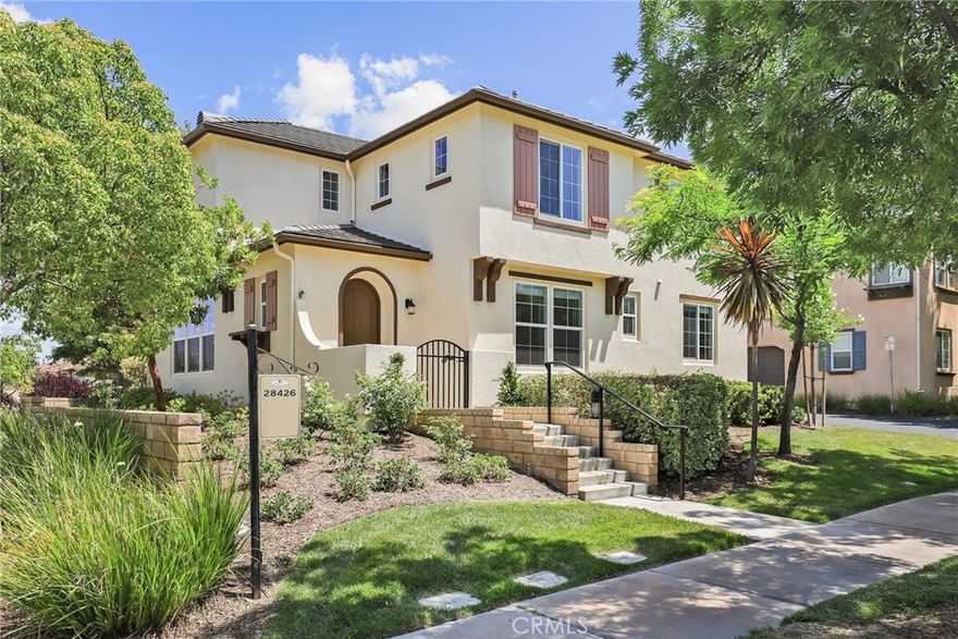 Welcome to one of the most desirable homes in the prestigious Aria Tract of West Creek! This beautifully upgraded three-bedroom two-and-a-half bathroom corner-lot residence boasts one of the largest private yards in the entire community and even includes a rare virtually private guest parking spot, plus your oversized two-car garage. From the moment you enter, you'll notice the warmth and charm, with engineered hardwood flooring flowing through the entryway, kitchen, and dining room. The spacious living room features a custom built-in bench and entertainment center, creating a perfect space to relax or entertain.





Glass doors lead you to a stunning backyard retreat, complete with a custom stone patio, attached patio cover, grassy play area, beautiful landscaping, and a raised wooden deck—ideal for entertaining or simply unwinding. The thoughtfully landscaped yard also features stone planters that add evening ambiance. Inside, the kitchen is a chef's dream with granite countertops, upgraded stainless appliances including a split oven, and custom butcher block workspace with added built-in cabinetry. Adjacent to the kitchen is a bright dining area and a conveniently located half bathroom.





Upstairs, a built-in desk area off the landing provides a great spot for working or studying. All three bedrooms are generously sized with ample closet space. The secondary bedrooms share a well-appointed bathroom with stone tile flooring and a shower/tub combo. The expansive primary suite offers a spa-like bathroom with a glass-enclosed shower, large soaking tub, stone tile flooring, and dual closets—one of which has been thoughtfully converted into a private home office with its own window for natural light.





This home has been recently painted inside and out and includes brand-new carpet. As a resident of West Creek, you'll have access to three sparkling pool and spa areas, BBQ facilities, and a private clubhouse. Top-rated schools, scenic paseos, and excellent dining and shopping are just minutes away. This rare opportunity combines location, upgrades, and lifestyle—don't miss your chance to make it yours!
