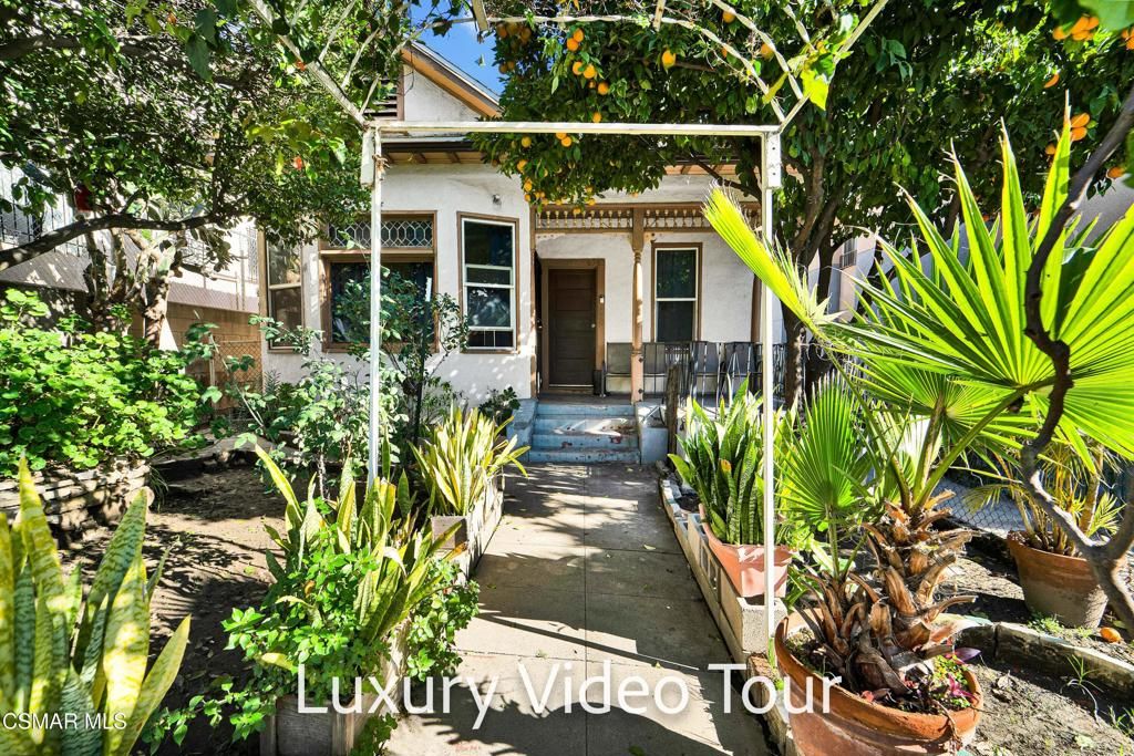 Photo of 638 N Bunker Hill Avenue, Los Angeles, CA 90012 (MLS # 226000109)
