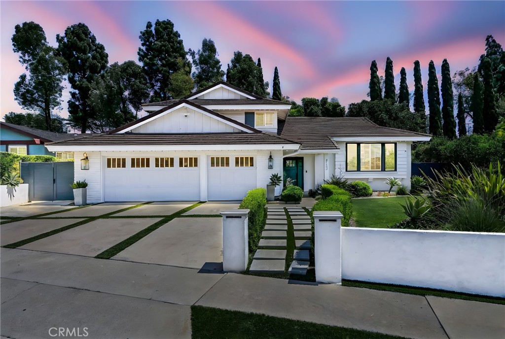 Stunning Fully Remodeled 4-Bedroom Home in the Heart of Yorba Linda! Gorgeous Newer Upgrades Throughout, Including Beautiful Wood Look Tile Flooring, Fresh Paint Inside and Out, Smooth Ceilings, Recessed Lighting, Dual-Pane Windows, Plantation Shutters, Crown Moldings and More! Nearly 2,300-SqFt Split Level Floorplan has a Main Floor Bedroom and Full Bathroom - AMAZING Remodeled and Expanded Kitchen Features Vaulted and Beamed Ceiling with Skylights, White Soft-Close Cabinetry, Caesarstone Quartz Countertops, Breakfast Eating Nook, and All Stainless-Steel Appliances, Including Built-In Refrigerator, Double Ovens, Dishwasher and 6-Burner Gas Cooktop with Hood - Kitchen is Open to Spacious Family Room with Fireplace, Custom Built-Ins, and Surround Sound Speakers - Three-Panel Sliding Glass Door Opens to Large Private Backyard ... Surrounded by Mature Trees with Plenty of Space for Outdoor Dining & Entertaining - Upstairs Primary Suite has a Walk-In Closet and Barn Door Leading to the Primary Bath with Dual Vanities & Shower - Upstairs are Two More Bedrooms & a Full Hall Bath - All Bathrooms have Been Remodeled and Upgraded with Quartz Vanities - Attached 3-Car Garage with Built-In Cabinetry (one stall of garage converted to a laundry room with sink, there is still space to park a small car or a golf cart!) Centrally Located and Zoned for Top-Rated Schools, Fairmont Elementary, Orange County School of Computer Science at Bernardo Yorba Middle, and Esperanza High