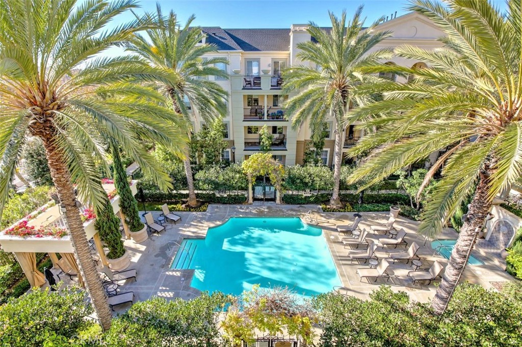 Simplify your life in this fully furnished, centrally-located and serene luxury home in the renowned Watermarke community. Enjoy resort-style living with amenities such as concierge service, a top-notch fitness center, business facilities, a movie room, basketball and tennis courts, along with three pools and four spas. A designated parking space is conveniently located on the same floor as the condo in the building, so no elevator hassle - just park and walk straight to your unit; an extra parking space is also available on the floor above. This two-level condo is adjacent to Newport Beach, just a 5-minute drive from Santa Ana airport, a mile from UCI campus, and a short distance from the beach. Easy access to major freeways and within walking distance to shopping and restaurants.