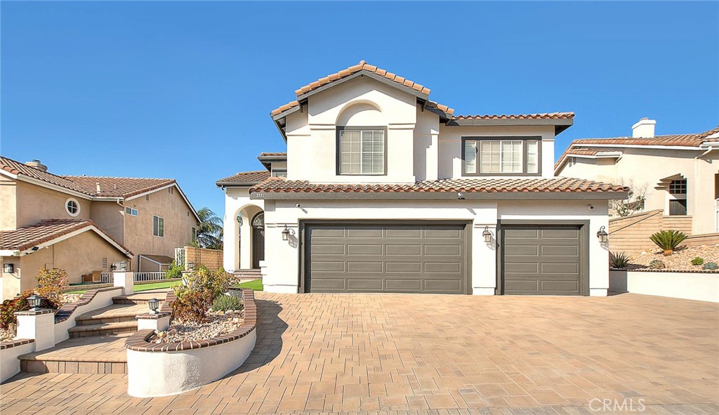 Stunning 5-Bedroom Home in Prime Corona Location!
Welcome to 3571 Rio Ranch Rd, a beautifully maintained home nestled in the desirable community of Corona, CA just a short drive from Orange County. This spacious 5-bedroom, 3-bathroom residence offers approximately 3,031 sq ft of comfortable living space, perfect for families or professionals seeking a peaceful and stylish retreat.
Step inside to find abundant natural light and thoughtfully designed open floor plan with high ceilings, large windows, and elegant marble floors and wood flooring throughout the house. The open-concept kitchen features granite countertops, ample cabinetry, a center island, and 6 burner cooktop and stainless steel appliances – ideal for both everyday meals and entertaining guests.
The primary suite includes a walk-in closet and a spa-like en-suite bathroom with dual vanities, soaking tub, and separate shower. Additional bedrooms are generously sized with great closet space. A downstairs bedroom and full bath are perfect for guests, home office or multi-generational living.
Enjoy California living at its best with a private backyard complete with a covered patio, ideal for weekend barbecues or relaxing evenings under the stars. The home also features dual central HVAC, indoor laundry room, and a 3-car garage for added convenience.
Located near top-rated schools, shopping, dining, and with easy access to the 15 and 91 freeways – this home combines comfort, style, and convenience in one perfect package.