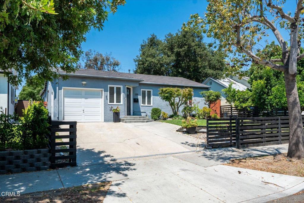 Welcome to this thoughtfully updated 3-bedroom, 2-bathroom pool home in the heart of Burbank. Spanning 1,460 sq ft, this residence seamlessly blends original character with modern upgrades, including hardwood floors, recessed lighting, and an ideal, flowing layout.The living room is warm and inviting--a perfect place to relax, catch up with loved ones, or enjoy your favorite shows. With a comfortable and open atmosphere, it serves as the heart of the home and effortlessly connects to the dining and kitchen areas.Just beyond, the updated kitchen--remodeled in 2013--offers both style and functionality. It features newer appliances, ample cabinetry, a large pantry, utility closet, and even a dedicated wine storage area. The adjacent dining space is bright and airy, illuminated by a stunning skylight that not only brings in natural light but also enhances the ceiling height and ambiance.Two spacious bedrooms and a full bath are located off the main hallway--ideal for guests, family members, or a home office. Each room offers generous closet space and convenient access to the beautifully updated hall bath.Privately situated at the rear of the home, the primary suite is a true sanctuary. Featuring vaulted ceilings, a fireplace, and two sets of French doors that open to the backyard, this retreat blends comfort and luxury. The suite also includes a spacious closet and an ensuite bath with an oversized shower and contemporary finishes.The nearly 7,000 sq ft lot offers a resort-style backyard--perfect for year-round entertaining. Enjoy a large patio ideal for al fresco dining, a sparkling swimming pool, grassy area with citrus trees, and a cozy outdoor fireplace.Located close to top-rated Burbank schools, beloved local spots like the Ugly Mug, and a variety of shopping and dining options, this is the Burbank opportunity you've been waiting for!