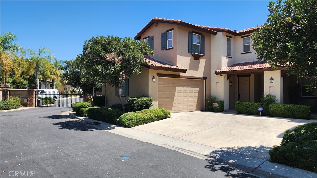 This Condo has one of the largest yards in the community. Take a look at the pictures. Features 3 Bedrooms and 2.5 Bathrooms. No Carpet, kitchen and baths have tile floors and the rest of the home has wood floors. All of the bedrooms are upstairs. Open Floorplan with a Spacious Kitchen with granite countertops and built in microwave and dishwasher. Dining Area next to the kitchen that opens to the living room and a large glass slider to the back yard. Fireplace with gas log and custom tile work. Ceiling Fans Throughout. The Laundry Room is Inside/Upstairs for your convenience. The Main bathroom features a spacious vanity with dual sinks and upgraded custom tiled shower. Central Air Conditioning and Heat. Double Pane Windows and blinds for privacy. Two Car Attached Garage fully drywalled and a Window which allows plenty of light, not to mention the epoxy coating to protect the concrete. Automatic Garage Opener. The back and side yards have lots of space for your family gatherings. Concrete planter garden dividers and artificial turf to save on water. Enjoy the Home Owners Association Swimming Pool, Tennis Court, Basketball Court, BBQ and Play Areas. You can almost walk to Lake Perris recreation area and very close to the 215 Freeway. Come and take a look.
