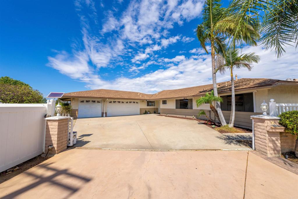 Stunning View Home on Private .62 Acre Lot! Perched above it all, this spacious 2,800 sq. ft. 3 bedroom (plus office/library), 2.5 bath home offers sweeping views of the El Cajon Valley, Santee, Lakeside and even the mountains beyond. Recently remodeled throughout, the home showcases a modern kitchen and baths with sleek quartz counters, durable vinyl plank flooring, recessed lighting, and fresh finishes. The inviting floor plan includes a cozy fireplace, a separate office/library and even a dedicated laundry room. Walls of windows flood the interior with natural light and capture the panoramic scenery from nearly every room. A rare 3-car garage provides ample parking and storage, while the expansive .62-acre lot offers exceptional privacy and room to enjoy the outdoors. With its blend of updated style, flexible living spaces, and unmatched views, this home is a true East County gem.