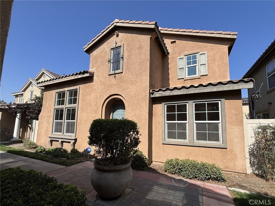 Located in the La Rivera HOA, this spacious 3 bedroom home offers a large downstairs bonus room that could be used as an office or a 4th bedroom. The kitchen has just been updated with Quartz counters and a new dishwasher. It has a breakfast bar and dining area with a sliding door to the private patio.  The living room has a vaulted ceiling and ample natural lighting. Upstairs is a generously sized primary suite with a large walk-in closet, dual sink vanity, a walk-in shower and soaking tub. Laminate wood floors throughout.  2 car garage with direct access. Main floor laundry room. The gated community includes a pool, spa, playground,  greenbelt and walking paths. Close to the 60 freeway. Freshly painted and cleaned, this home is move in ready!