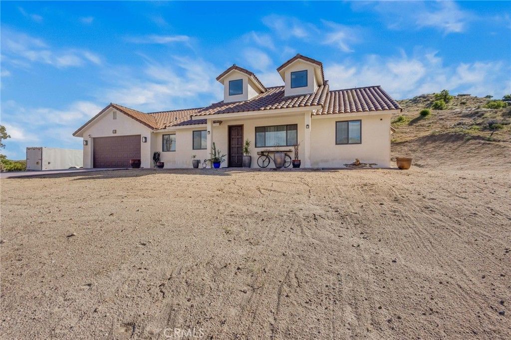 Photo of 49111 Paradise Ave, Morongo Valley, CA 92256 (MLS # SW26033933)