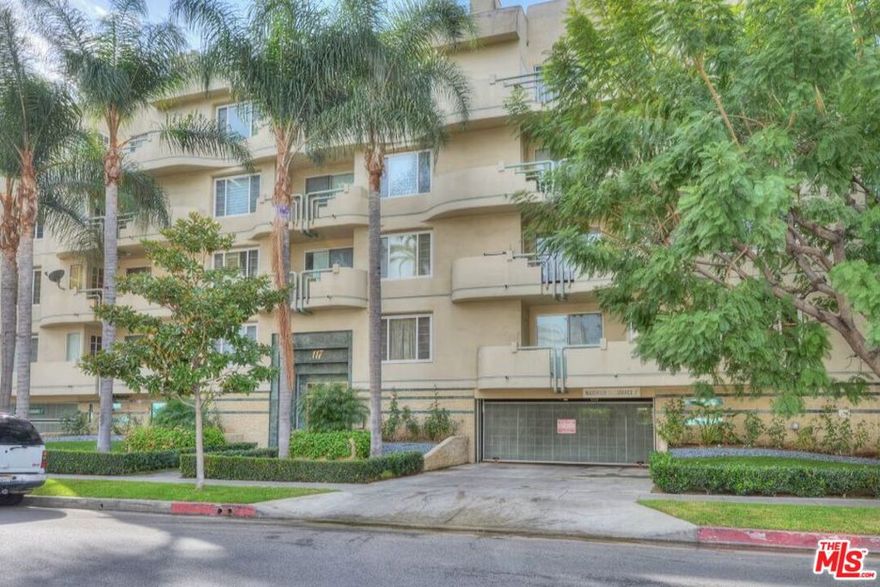 Front facing 2 bed, 1.5 bath bright and spacious condo in Beverly Hills. A+ location close to the Beverly Center and The Grove. Formal entry leads to an open kitchen overlooking both living and dining areas, complete with high ceilings, oversized windows, and airy floor plan perfect for entertaining. The kitchen features stainless steel appliances, beautiful granite counter tops, and an abundance of cabinet space. Wide hallway with built-ins and closet lead to a second bedroom/office and huge primary suite. The primary bedroom boasts a walk-in closet, decorative fireplace, and en suite bathroom with dual sink vanity and spa/jacuzzi tub. One assigned parking spot and extra guest spots in the gated garage; permit street parking available.  Washer/dryer in-unit along with central AC. Small dogs ok.