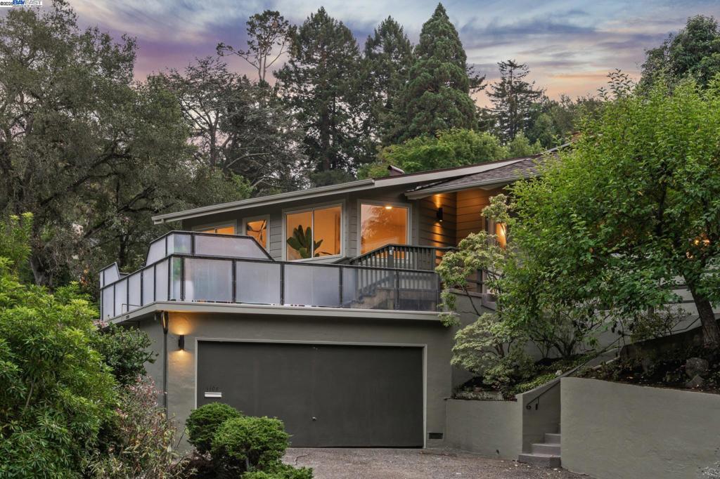 Live in a peaceful paradise in this upgraded 3BD/2BA Mid-Century home in Berkeley’s historic Park Hills neighborhood. Designed to enjoy nearby Tilden Park’s natural beauty, this 1,473 SQFT home overlooks gorgeous vistas, with a front deck and back patio for indoor/outdoor living, and a nearby neighborhood trail directly to the park. The sunny living room awes with a vaulted redwood ceiling, a picture window with treeline view, and a fireplace with built-in bookcases. Hardwood floors span into the dining room featuring French doors to the backyard. Dine al fresco on the patio, or garden to your heart’s content in the extensive terraced raised beds. With two skylights, windows, and backyard access through a laundry area, the kitchen also feels part of the outdoors while offering modern upgrades in appliances, countertops, and recessed lighting. The sleeping wing is tucked away where two bedrooms with roomy closets share a stylish full bath, and one of the bedrooms enjoys doors to the deck. The primary bedroom features an ensuite bath and glass doors to the backyard. A 2-car garage provides off street parking. Out your front door, Berkeley’s world-class amenities and Tilden is a playground for all ages with golfing, swimming, a botanical garden, trails, and so much more!