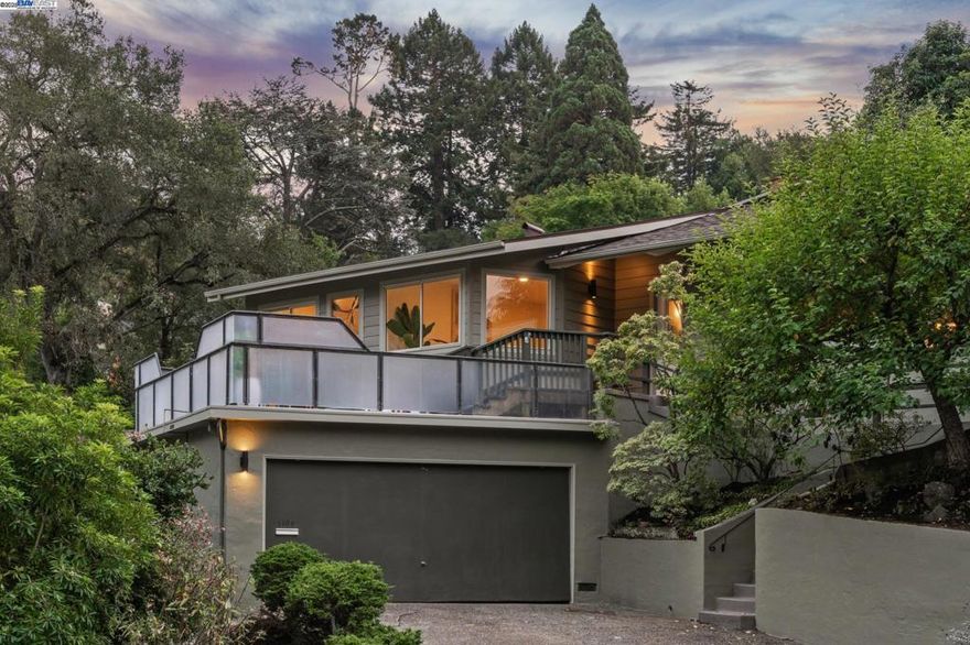 Live in a peaceful paradise in this upgraded 3BD/2BA Mid-Century home in Berkeley’s historic Park Hills neighborhood. Designed to enjoy nearby Tilden Park’s natural beauty, this 1,473 SQFT home overlooks gorgeous vistas, with a front deck and back patio for indoor/outdoor living, and a nearby neighborhood trail directly to the park. The sunny living room awes with a vaulted redwood ceiling, a picture window with treeline view, and a fireplace with built-in bookcases. Hardwood floors span into the dining room featuring French doors to the backyard. Dine al fresco on the patio, or garden to your heart’s content in the extensive terraced raised beds. With two skylights, windows, and backyard access through a laundry area, the kitchen also feels part of the outdoors while offering modern upgrades in appliances, countertops, and recessed lighting. The sleeping wing is tucked away where two bedrooms with roomy closets share a stylish full bath, and one of the bedrooms enjoys doors to the deck. The primary bedroom features an ensuite bath and glass doors to the backyard. A 2-car garage provides off street parking. Out your front door, Berkeley’s world-class amenities and Tilden is a playground for all ages with golfing, swimming, a botanical garden, trails, and so much more!