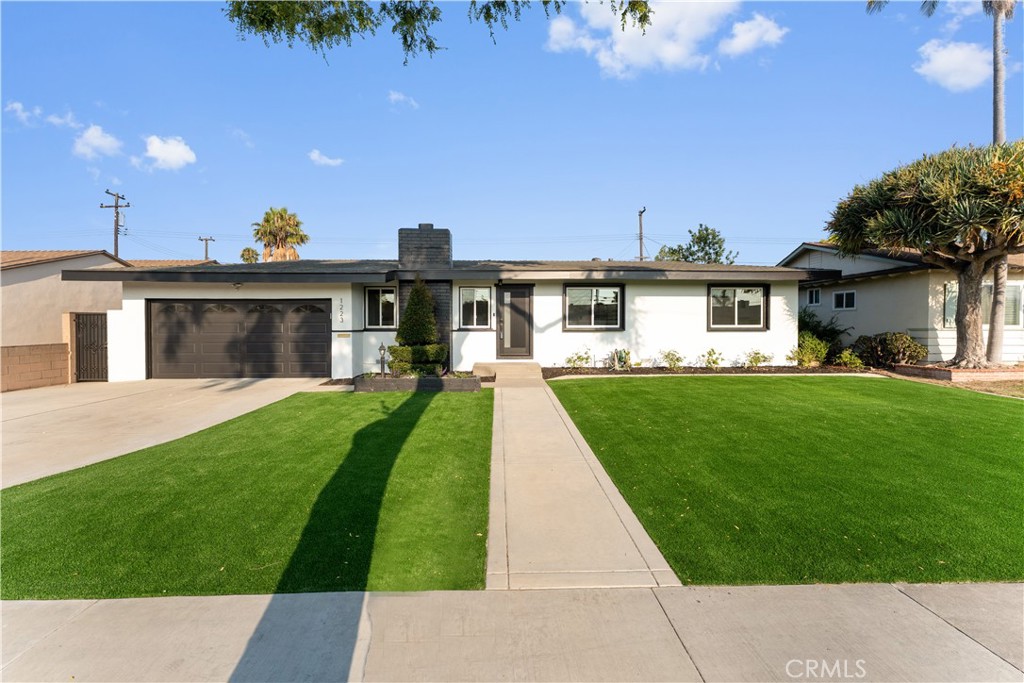 Welcome to 1223 E Gates Street located in Anaheim, CA. This Fully Remodeled Turnkey Home is just minutes from Disneyland & Knott’s Berry Farm!
Step into modern comfort and style with this beautifully remodeled single-story home located in one of Anaheim’s most desirable neighborhoods. This 3-bedroom, 2.5-bath residence boasts clean curb appeal with a fresh white exterior, black accents, new windows and front door, brand new turf and lush landscaping. Inside, you’ll find a completely upgraded interior with an open-concept layout, high quality laminate flooring, custom cabinetry, quartz countertops, stainless steel appliances, and designer finishes throughout. The bathrooms have been fully renovated with modern tile work, new vanities, and sleek fixtures. Enjoy new recessed lighting throughout along with freshly painted interior walls. The spacious backyard offers endless possibilities for entertaining or adding a pool and BBQ. Just minutes from world-famous Disneyland Resort and Knott’s Berry Farm, this home is also conveniently located near top-rated schools, shopping, dining, and freeway access. Whether you’re looking for your forever home or an investment opportunity, this Anaheim gem is a must-see!