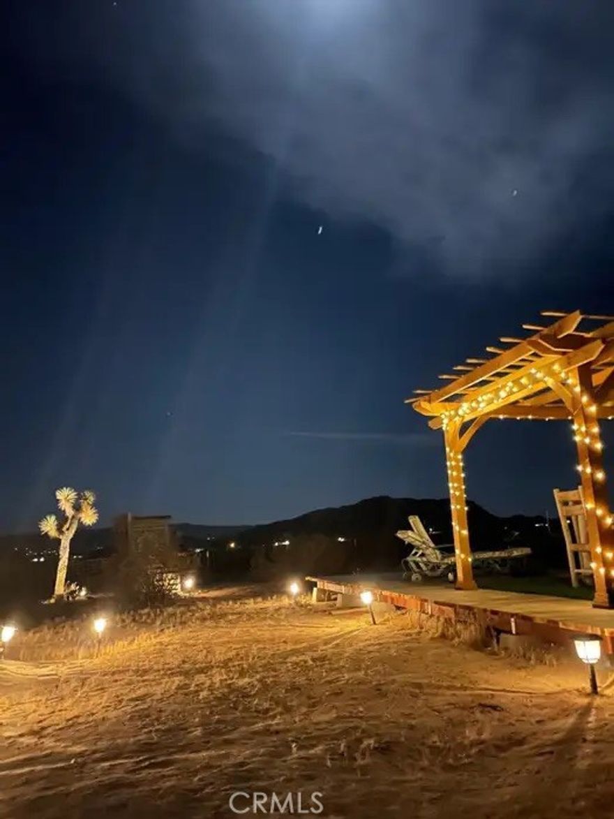 Welcome to Cassie's candlelight cabin! Glamp in style sun or snow you'll find a cozy Joshua campsite with cool desert vibe!

Panoramic mountain views and natural desert landscape. Close to everything fun that the high desert offers. Your off-grid base camp is minutes from Pappy and Harriets, the Red Dog Saloon, Joshua Tree Coffee Company and the Joshua Tree Saloon for live music and tasty BBQ!! Equal distance to scenic Landers and Joshua Tree National Park. Moon bathe on the wood deck or enjoy the songs of the coyotes from your tiny cabin! Call your favorite realtor for an appointment today! APN 059937206.
