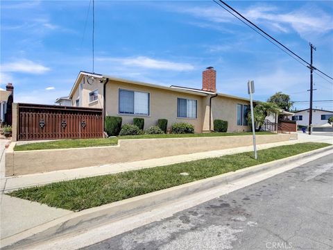 Photo of 12205 S Halldale AVE, Los Angeles, CA 90047 (MLS # TR26115378)