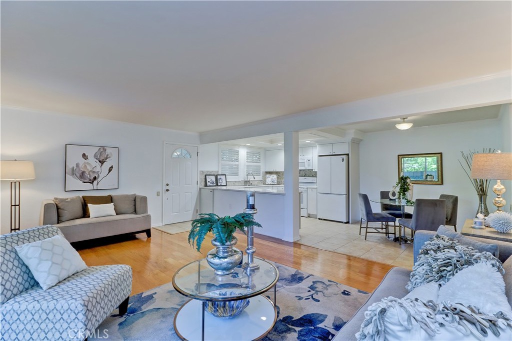 Welcome to this Gorgeous Remodeled Majorca. Everything you ever wanted! No Stairs, Amazing location, Greenbelt view with morning sun. As you enter the home, you are greeted by a large living room with direct access to your patio. The living room plantation shutters were custom designed with 3 level sliders for light and privacy. Beautiful modern open kitchen design with top of line appliances and 7 can lights. White quartz countertops with soft close cabinets. Both bathrooms have been professionally remodeled. Heat pumps in both bedrooms and living room. Main bedroom is large in size, en suite with stack washer/dryer. This lovely home includes, tile, wood and laminate floorings. Custom designer plantation shutters, freshly painted and duel pane windows. Move in ready. Conveniently located, this home is only 8 miles from Downtown Laguna Beach and offers easy access to all the community amenities such as: 27-hole golf course, tennis courts, separate pickle ball courts, five swimming pools, three fitness centers, seven clubhouses including Clubhouse 4 offering amazing classes in art, ceramics, wood shop, jewelry-making, and sewing, and much more. Whether you enjoy socializing with neighbors or pursuing your favorite hobbies, Laguna Woods Village offers something for everyone. The HOA includes water, sewer, trash, cable TV and landscaping. Don’t miss the opportunity to own a move-in ready home in the most sought after 55+ community in Orange County.