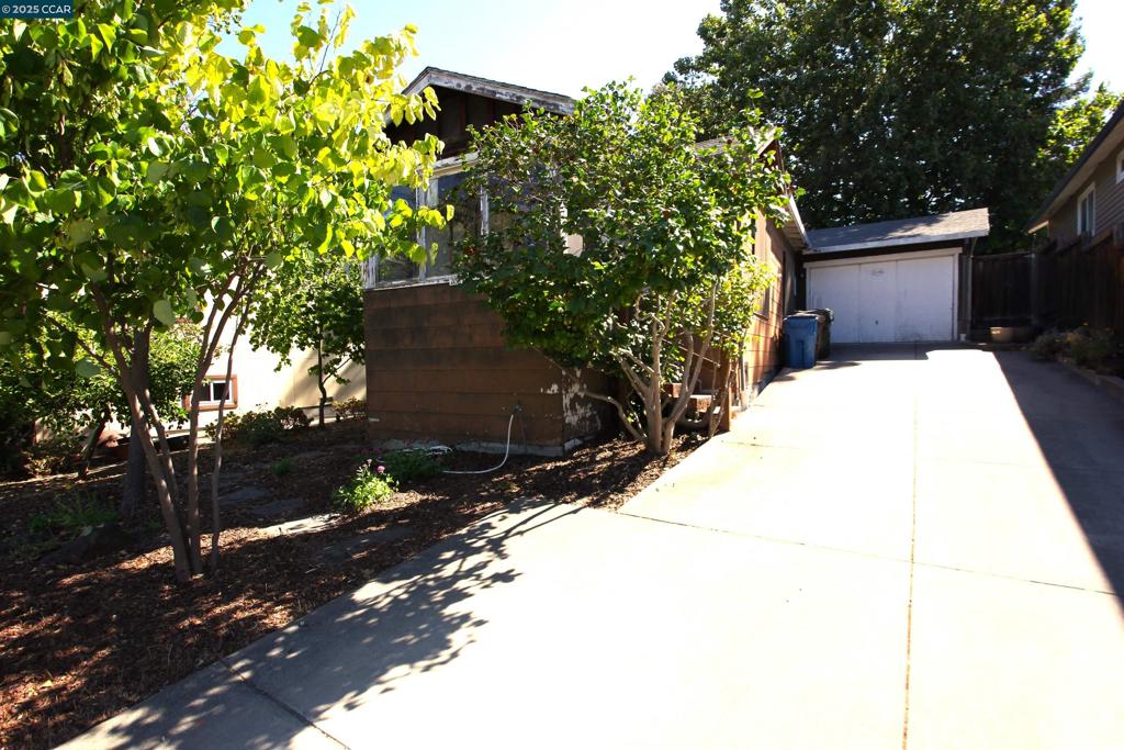 Back on Market, Buyer could not perform and interest rates are now lower. Upsloping lot with views from under your beautiful shade tree. Long 1 Car Attached Garage or Shop and a big backyard. Built in approximately 1926 with an additions since then. Coveted Morello Park Elementary. Long Driveway with Off Street Parking. Approximately 128 foot deep lot. Splitter Unit with A/C at rear of interior. Stand-up sub-area storage. Pretty cool property. Bring your hammer and make it your Own. Close to Historic Downtown Martinez shops, restaurants and the Regional Shoreline. Main Street also hosts a fabulous Farmer's Market each Sunday. Enjoy the local marina, playgrounds, and bocce courts. Easy access to I-680 & HWY 4. NOT in the new Fire Hazard Severity Zone. NOT in a flood Zone. NO HOA. Please DO NOT walk onto the property without an Agent or Broker. Sub-Area has 5+ foot of headroom. Property to be sold in its present condition. Seller willing to give concessions to the "Buy-Side" of this transaction. Come take a look :~)
