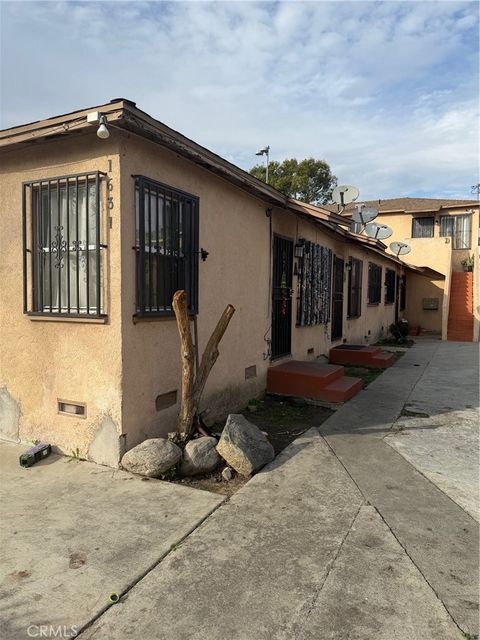 Photo of 1631 E Saunders St, Compton, CA 90221 (MLS # PW25281996)