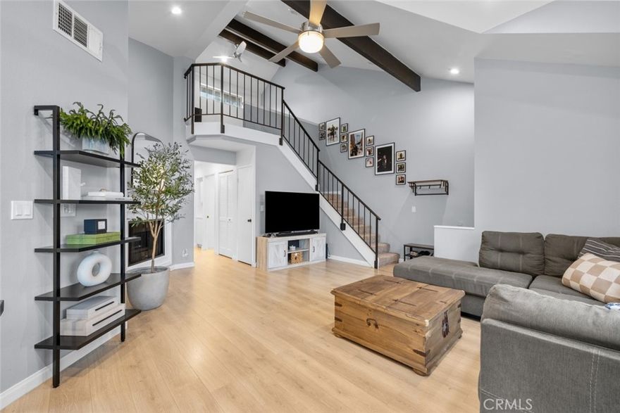 Located in the heart of Canyon Country, this 2-bedroom, 2-bathroom home offers 964 sq ft of bright and comfortable living space. The interior features laminate flooring, recessed and natural lighting, high ceilings, and a cozy fireplace that enhances the spacious living area. A versatile upstairs bonus room with a loft-style design adds flexibility for a home office or additional lounge space. The full kitchen offers ample cabinetry and functionality, while the private balcony provides a relaxing outdoor retreat.

Residents enjoy access to a range of community amenities, including a pool, hot tub, and tennis court. The property also includes secure parking in a subterranean garage. Nestled in a well-maintained and attractive neighborhood, this home offers the perfect combination of comfort, convenience, and lifestyle.