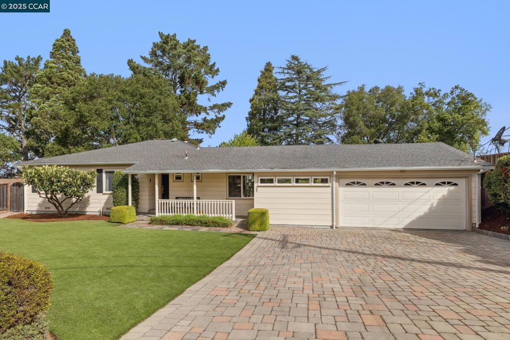 Rare opportunity awaits in one of Glorietta’s most coveted streets. First time in 60 years, this traditional single-level rancher sits on .53AC flat lot w stunning views of Mt. Diablo. Combining classic charm w thoughtful updates, the home offers 1,805± SF of living space, 3 generous bedrooms w ample closets, & 2 beautifully updated bathrooms with timeless finishes. Open-concept living & dining areas are anchored by brick fireplace & custom built-ins, while picture windows & glass sliders invite natural light & seamless access to the backyard. Remodeled kitchen w chic blue cabinetry, crisp white counters, & brass accents flows into spacious family room, where large windows & sliding doors open directly to a lovely patio—an ideal extension of California’s coveted indoor-outdoor lifestyle. Additional highlights include:dedicated laundry room w sauna & garden access. Outdoors w large flat backyard provides endless possibilities: private retreat for entertaining & play, gardener’s haven, or blank canvas for future expansion. Nestled in peaceful private setting & minutes from town, BART, & top-rated schools, walkable to Glorietta Elementary. With iprime location, usable land, & timeless style, home presents immediate comfort & extraordinary potential to create your dream home.