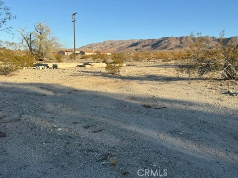 Photo of 7023 Woodward Road, 29 Palms, CA 92277 (MLS # HD26202375)