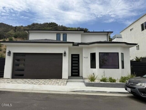 Photo of 7420 Valaho Lane, Los Angeles, CA 91042 (MLS # P1-29255)