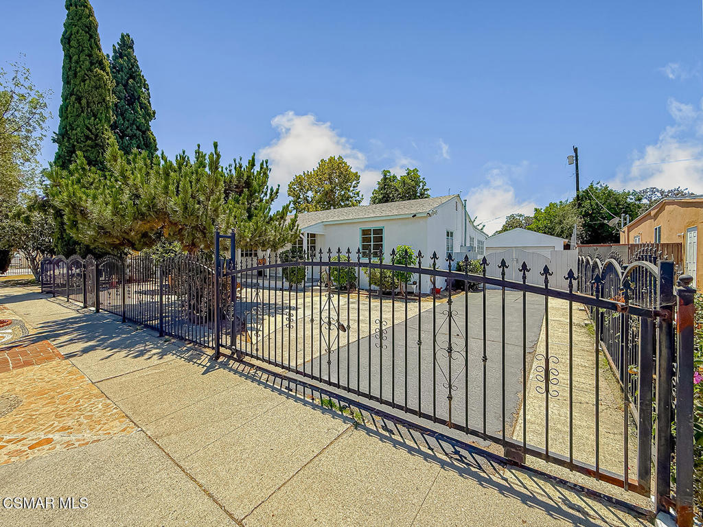 Unlock the potential of this mid-century gem in the heart of Panorama City. This four-bedroom two-bath home is bursting with opportunity for the visionary buyer. Featuring classic mid-century lines and a spacious floor plan, the home sits on a generous gated lot with a large backyard, perfect for outdoor entertaining, expansion, or even an ADU. Whether you're and investor or a homeowner looking to restore and personalize a property, this is the canvas you've been waiting for. Centrally located close to shops, schools and eateries. Don't miss your chance to create something truly special.