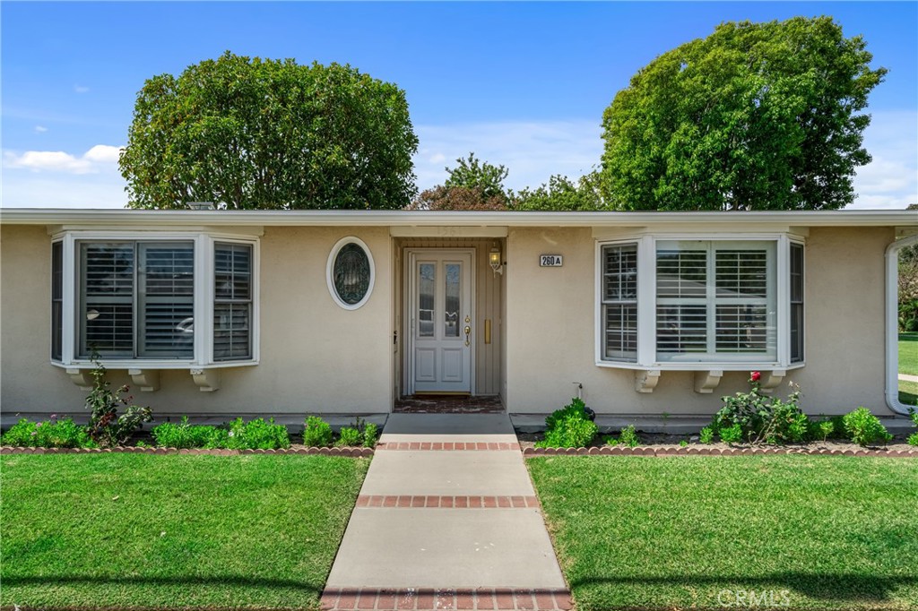 Welcome to 1561 Interlachen Road, M10-260A in Seal Beach’s highly desirable Leisure World community!
This FULLY EXPANDED 2-bedroom, 1.5-bath corner unit offers comfort, style, and a prime location on a wide greenbelt. Designed for easy living, the single-level floor plan features an inviting living room with dual bay windows, plantation shutters, and abundant natural light.
The open dining area flows into a stunning remodeled kitchen with granite countertops, stainless steel appliances, custom cabinetry with glass-front doors, and a bright skylight. The thoughtful layout includes two spacious bedrooms, a full bathroom with tasteful finishes, plus a convenient additional half bath for guests.
Enjoy peaceful outdoor views right from your living room or take advantage of the lush, park-like setting just outside your front door. The private entryway and decorative oval window add charm and curb appeal.
Located in Leisure World Seal Beach, a secure 55+ guard-gated community, residents enjoy resort-style amenities: a 9-hole golf course, swimming pool and spa, fitness center, amphitheater, library, post office, and over 200 clubs and activities. All this, just minutes from shopping, dining, medical facilities, and the beach.