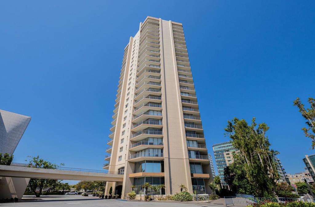 Exquisite luxury condo with exceptional high-quality finishes throughout, spectacular views, and located in one of the best neighborhoods in the heart of San Francisco! This stunning and spacious 1 bedroom condo in the iconic Cathedral Hill Tower has a wonderful open floor plan and stunning cityscape views of the Civic Center, downtown, and even a peek of the Golden Gate Bridge. The beautifully updated kitchen has elegant custom cabinetry, granite counters, a breakfast bar area, engineered plank flooring, and a wine fridge. There is a dining area off of the kitchen and a large open living room to take in the gorgeous city views. The spa-like bathroom has a slab marble shower enclosure, marble counter top, and a stone accent wall. The spacious elevated bedroom has custom built-in cabinetry and convenient double closets. The large balcony is perfect for soaking in the view and taking in the natural beauty and the renowned architecture that makes the Cathedral Hill neighborhood such a special and coveted location. Close to the Civic Center, the Fillmore District, Lower Pacific Heights, Japantown, Nob Hill, Union Square, Fisherman's Wharf, and so much more! This elegant well appointed condo is being offered furnished with much of the beautiful, tasteful furniture included.