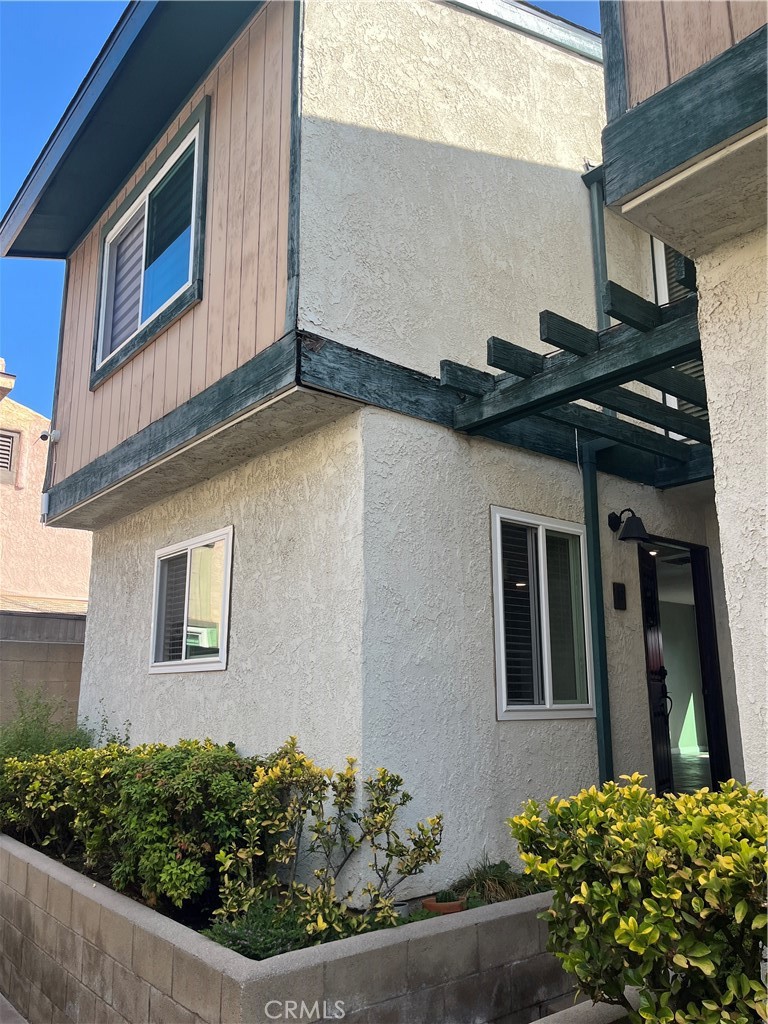 Nicely upgraded, 2 bedroom, 2 bath townhome. 2 car garage and private patio. Gated community. Improvements include: Dual pane windows, Remodeled kitchen with granite countertops, Custom cabinets and new fixtures. Remodeled baths have new cabinets, countertops and new fixtures. Fresh paint, custom tile and LVP/wood flooring throughout. Very modern and quality upgrades throughout! Refrigerator, washer and dryer included. No pets allowed.