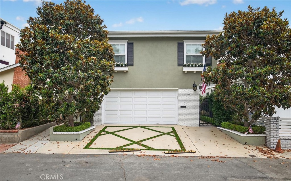 Welcome to this beautifully maintained 3-bedroom, 2-bathroom home for lease in the Sand Section of Manhattan Beach. Blending coastal charm with modern updates, this residence offers a comfortable and stylish retreat just blocks from the beach.
The inviting living room features hardwood floors, a cozy fireplace, and recessed lighting. The well-appointed kitchen includes wood cabinetry, granite countertops, stainless steel appliances, and a garden window that fills the space with natural light. Bedrooms are bright and versatile, highlighted by a spacious primary suite with vaulted ceilings, exposed beams, and an en-suite bathroom. Both bathrooms have been tastefully remodeled with updated finishes and fixtures.
French doors open to a private courtyard ideal for outdoor dining, entertaining, or simply relaxing. The home also includes a two-car garage with a decorative driveway and extra storage.
Situated close to award-winning schools, local parks, and downtown Manhattan Beach, this home offers the best of coastal living.