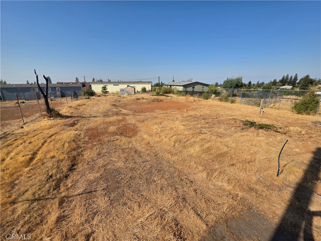 Great price for this flat 0.17 acre parcel ready to build, on the southwest side of paradise with easy access to Chico. Just around the corner from Joy lyn's candies, the Paradise Depot museum, Gold Nugget Museum and duck pond. The street has also recently been repaved and the water is connected!