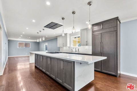 Photo of 5502 S Chariton Avenue, Los Angeles, CA 90056 (MLS # 26831561)