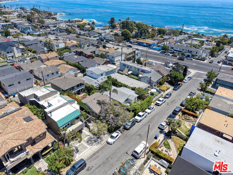 North Laguna Townhome with Ocean Views! Beautiful 2 bed, 2 bath townhouse-style unit just steps from the beach and scenic hiking trails. Enjoy ocean views from multiple balconies, high ceilings, and an abundance of natural light throughout. Spacious split-level layout with updated finishes, in-unit laundry, and direct-access 2-car garage. Private and quiet, yet conveniently close to downtown Laguna shops, dining, and galleries. Don't miss this light-filled coastal retreat in one of Laguna's most sought-after neighborhoods!