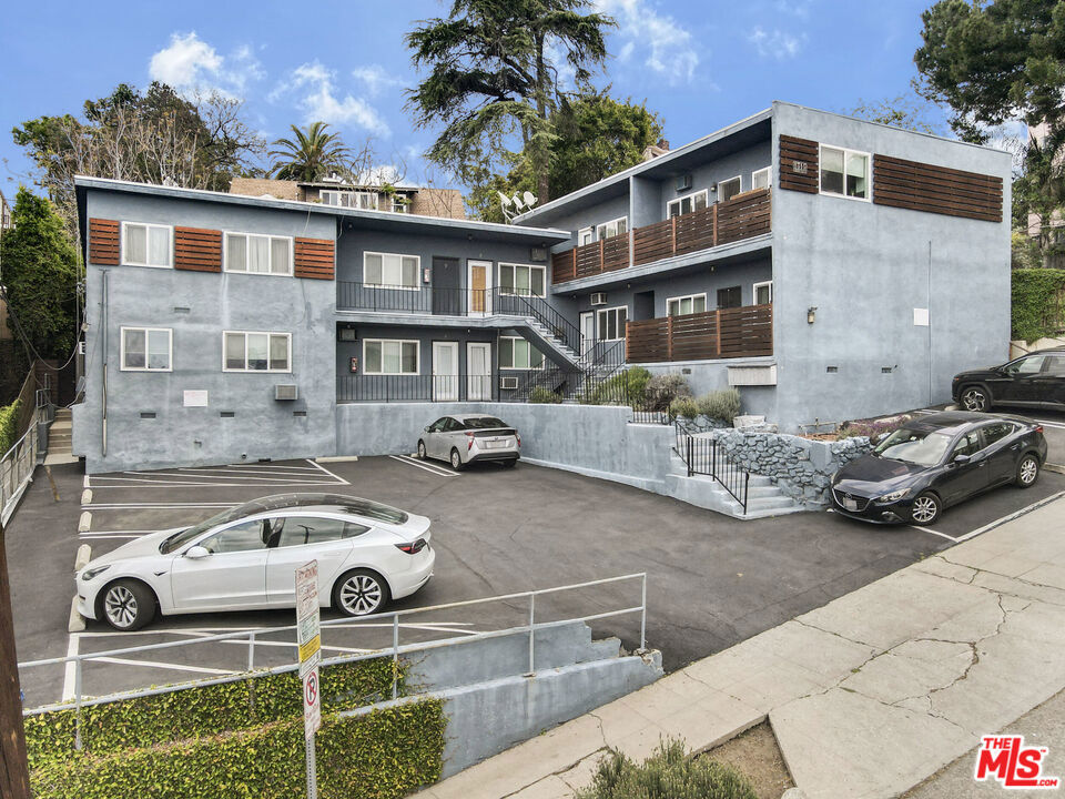 THE OPPORTUNITY: Montana Hillside Apartments is an ideal fit for a long-term investor seeking a pride-of-ownership asset in one of L.A.'s most character-rich and walkable neighborhoods. Located just one block from the vibrant Sunset Blvd corridor and minutes from Dodger Stadium, the property offers unbeatable lifestyle access while maintaining a quiet, elevated residential setting. Eight of the ten units have been thoughtfully renovated with high-end finishes, positioning the asset as best-in-class for mid-century vintage product in Echo Park. With in-place rents still over 20% below market, there's meaningful upside through natural turnover without the risk or complexity of a heavy reposition. This is a rare opportunity to own a stabilized, design-forward building in a supply-constrained enclave that continues to attract strong, long-term tenant demand. THE PROPERTY: Montana Hillside Apartments is a boutique 10-unit mid-century modern apartment building nestled in the hills of Echo Park. Constructed in 1960, this 5,152 square foot property sits on an expansive 8,865 SF LAR1.5-zoned lot, offering a blend of classic architecture and contemporary upgrades. The unit mix comprises a combination of spacious one- and two-bedroom layouts, with eight units extensively renovated to include quartz countertops, stainless steel appliances, farmhouse sinks, oversized tubs, custom cabinetry, plank flooring, and air conditioning. Select units boast breathtaking views of Echo Park and Silver Lake, providing tenants with a serene living experience. The property features 10 parking spaces, new tankless water heaters, and an outdoor amenity space with potential for a dog run, enhancing tenant retention and lifestyle appeal. Its prime location offers residents a quiet, elevated setting just one block from the vibrant Sunset Blvd corridor and minutes from Dodger Stadium, ensuring easy access to a plethora of dining, shopping, and entertainment options.