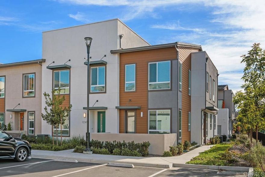 Nestled in the vibrant, newly built Soltaire community, this 2023 townhome blends modern comfort with the relaxed, sun-soaked lifestyle North County San Diego is known for. Located with award-winning San Marcos School District and just minutes from beaches, hiking trails, shopping, dining, and the 78 freeway, this home offers convenience without compromise. This is The Marlow, Soltaire’s most popular and hard-to-get floorplan, beloved for its thoughtful layout and effortless flow. Step inside to an open concept living space filled with natural light, where the kitchen, dining, and living areas come together for easy everyday living and relaxed entertaining. The upgraded kitchen features beautiful finishes, plenty of storage, and a brand-new refrigerator, making move-in even simpler. Upstairs, the spacious primary suite is a peaceful retreat with a walk-in closet and a bright ensuite bath. Two additional bedrooms and a full bath with soaking tub offer flexibility for family, guests, or a home office. Enjoy morning coffee or after work unwinding on the cozy front patio—your own little outdoor haven. Energy efficiency comes built-in with owned solar, Energy Star certification, and Indoor Air Plus designation for a cleaner, healthier home. Residents of Soltaire love the community pool, clubhouse, and the friendly neighborhood atmosphere. This home is not only beautifully upgraded—it also offers an excellent opportunity at a better price. Homes like this don’t come up often. Come tour this property today!