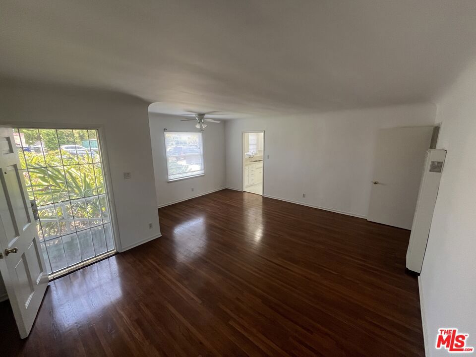 Welcome to this bright and inviting 2-bedroom, 1-bathroom front unit of a well-maintained duplex, ideally situated in a desirable Westside neighborhood among other like homes. This property features beautiful hardwood floors throughout, wall heater, window unit AC and convenient in-unit washer/dryer hookups. Enjoy the charm of the residential street while being just a short stroll away from popular eateries, bars, coffee and local shops. With easy access to major freeways, this location offers excellent connectivity and is centrally located to everything the Westside has to offer.