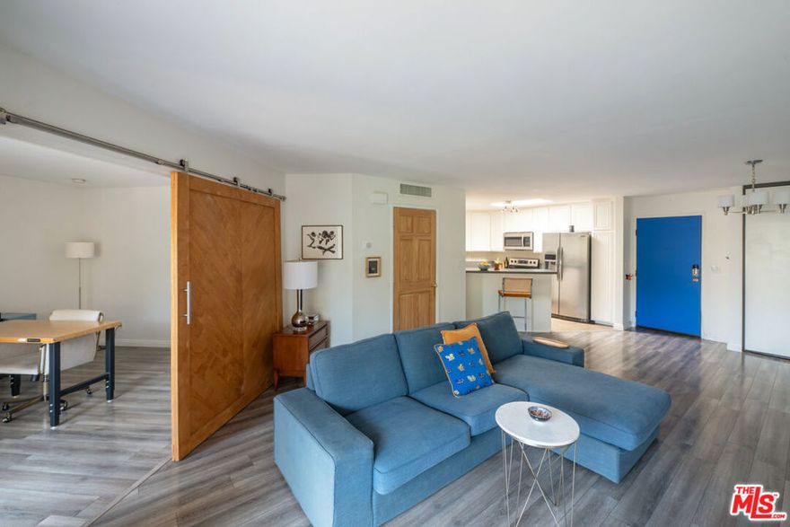 Imagine coming home to serene park and city views from your top-floor sanctuary in Monterey Hills. This is a special community - quiet, peaceful, and tucked away, yet ridiculously close to everything you need. This turn-key 2-bedroom, 1-bath condo at Eaton Crest feels instantly like home, thanks to a thoughtful, stylish refresh. The open floor plan is perfect for hanging out, cooking, and entertaining your friends. You'll love the upgraded details throughout: natural light pours through the skylight in the kitchen, with elegant quartz counters and stainless steel appliances. Updated lighting, custom architectural sliding door, and a gorgeous tiled shower make this space feel elevated and fresh. The main bedroom is spacious with wall to wall closets, and plenty of natural light. The second bedroom opens right up to your large, sunset-facing balcony - the perfect spot for evening contemplation or conversation. On site pool and jacuzzi, laundry in unit, central air/heat and two garage parking spots, make day to day life fun, convenient and comfortable. Live peacefully up here, just 3 minutes to the 110, with easy access to Highland Park, Pasadena, Eagle Rock, Silverlake, Los Feliz, or DTLA. Come see why people fall in love with Monterey Hills!