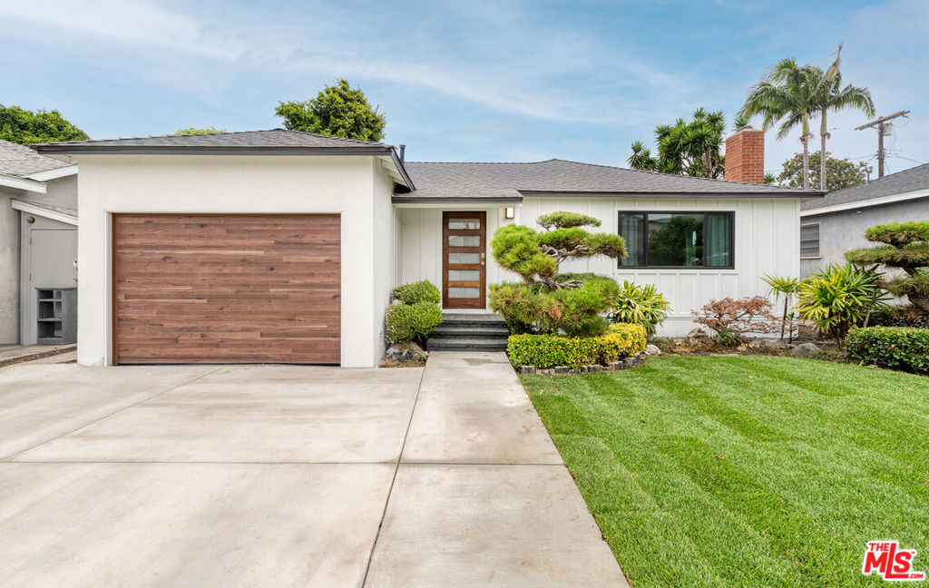 This beautifully remodeled residence is conveniently located adjacent to Playa Vista. The property comprises three bedrooms and two bathrooms and has undergone extensive renovations. The spacious open-plan living room benefits from abundant natural light, wide plank vinyl flooring, recessed lighting, and new dual windows throughout. The kitchen boasts a contemporary design with European-style cabinetry, quartz countertops, and stainless steel appliances. Both bathrooms have been tastefully updated, featuring tile finishes, floating vanities, and ample storage. The primary bedroom offers a generous closet and a stunning en suite bathroom, while the additional bedrooms also provide ample closet space. Hallways are equipped with additional closets as well as a sizable laundry room. The home includes a new roof, 200 amp electrical service with electric car prewiring, upgraded plumbing for waste and supply, a new central HVAC system, fresh sod lawns in both front and rear yards, and an automated sprinkler system. The backyard provides privacy and serves as a tranquil retreat. Additional features include a large single-car garage and a newly widened driveway that allows for side-by-side parking. Easy freeway access, minutes to LAX and near all Playa Vista has to offer which includes great restaurants, shops, movie theater and a whole foods. Professional pictures to be posted Friday.