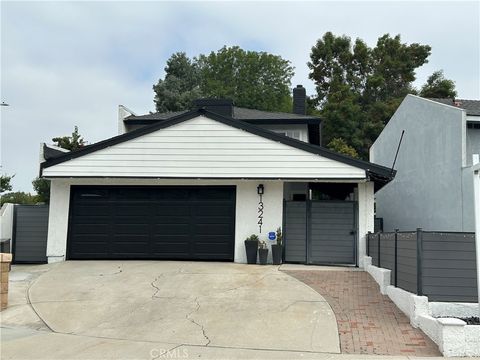 Photo of 13241 Oakwood Lane, La Mirada, CA 90638 (MLS # MB25165944)