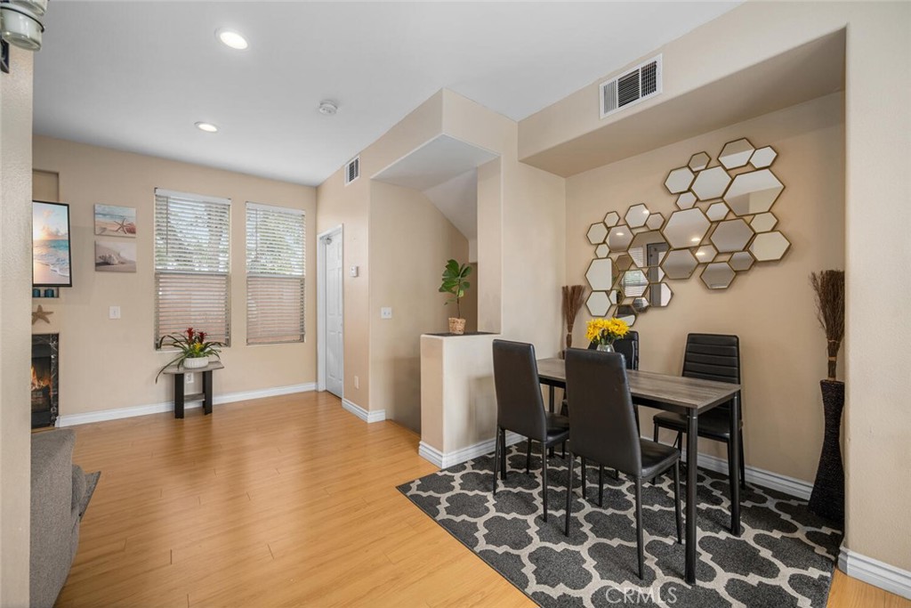 Discover this charming 2-bedroom townhome nestled in the vibrant heart of Long Beach. Featuring a stunning granite kitchen, elegant scraped ceilings, Re-done fireplace and sophisticated recessed lighting, this home is designed for modern living. Enjoy beautifully updated bathrooms and stylish flooring throughout. Step outside to a lovely renovated patio, perfect for relaxing or entertaining. With the convenience of a spacious two-car garage and in-unit laundry, this townhome seamlessly blends comfort and functionality. Don’t miss the opportunity to make this your dream home!