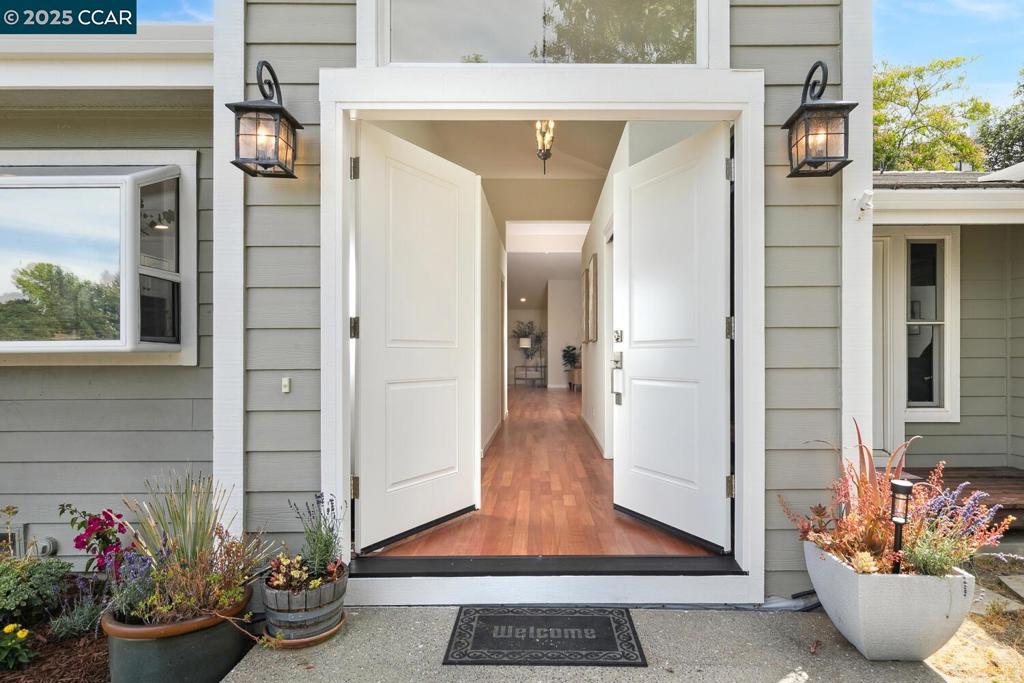 OH 8/3 2-4pm Wonderfully remodeled and sophisticated modern 4-bedroom, 3.5-bath home on a large premium lot that is nestled in one of Walnut Creek’s most sought-after neighborhoods offering beautiful design, lovely finishes, and exquisite attention to detail in a prime location. The open floor living space seamlessly incorporates two stunning Mahogany hardwood-floored living rooms both flooded with natural light and a large well equipped kitchen. Bordeaux Cabernet Granite counters, new double oven, wine refrigerator, walk-in pantry, & large center island create a luxurious, functional space perfect for cooking, entertaining, and everyday living. The stunning living spaces boast massive vaulted ceilings with sky lights with large windows & exterior doors to blend indoor and outdoor living. Long lasting cement tile roof, newer oversized 2-zone HVAC, newer sewer lateral, & pristine oversized 3 car garage with two electric vehicle chargers. Fabulous top-rated schools. Whether you’re looking for close to downtown with a rural feel, local shopping, or scenic trails everything you need is just moments away with an over half-acre lot only limited by your imagination