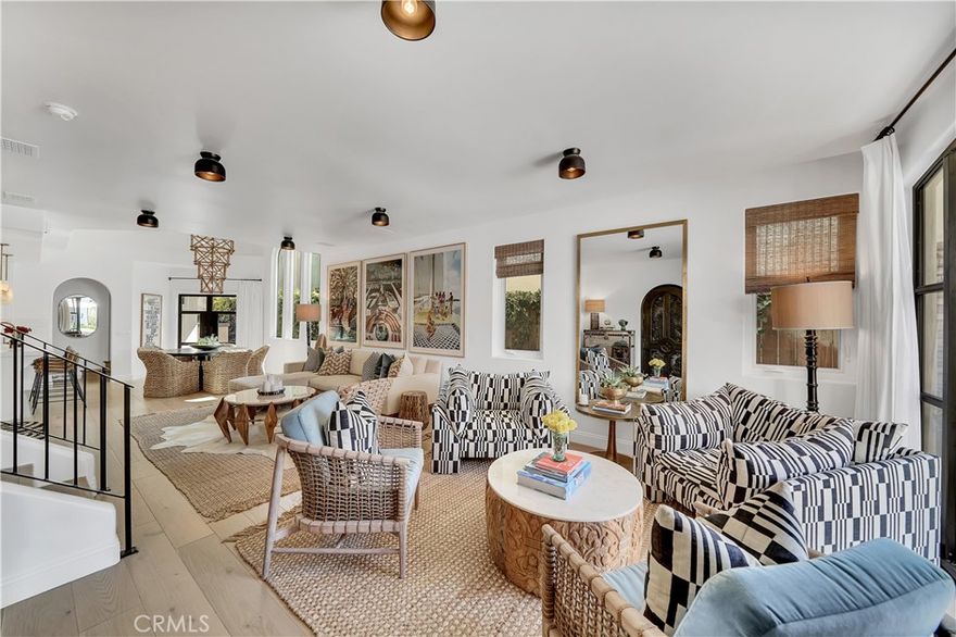 Discover an irresistible opportunity to retreat into the enchanting heart of Corona del Mar Village. This newly remodeled front unit is a showcase of custom designer finishes and refined, coastal sophistication. On the main level, a gourmet kitchen takes center stage with marble countertops, a newer Sub-Zero refrigerator, Viking range, Bosch dishwasher, and an inviting dining area framed by soaring ceilings and glass doors that open to a sleek BBQ station. The front patio sets the tone for effortless entertaining with its built-in fire pit, wraparound bench seating, outdoor dining area, and lush, manicured landscape. Inside, the family room offers two chic sitting areas, a cozy fireplace, powder room, and Smart TV—perfect for relaxed evenings or intimate gatherings. Ascend to the second level, where the primary suite indulges with its own fireplace, walk-in closet, and a spa-inspired bathroom featuring a separate soaking tub and shower. A second bedroom and full bath complete this level. The upper-level sunny bedroom, bath and private deck elevate the experience even further—offering breathtaking ocean vistas, romantic sunsets, and a front-row seat to boats gliding through the harbor. It’s the perfect sanctuary for sun-soaked lounging or quiet morning coffee. Just a leisurely stroll to iconic beaches, acclaimed restaurants, and world-class shopping—and minutes from John Wayne Airport—this home is truly the most coveted spot in town. Available for 2–12 months lease. Don’t miss your chance to experience coastal living at its most alluring.